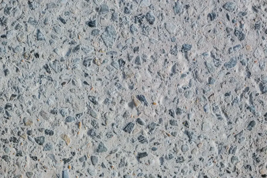 Exposed aggregate concrete surface with washed stone showing through